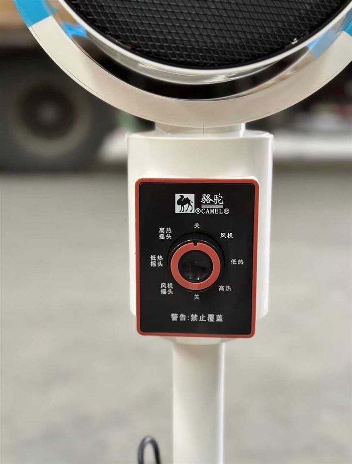 骆驼空气循环暖风机，一机两用 风机自然风模式，低热高热两档可调 左右**，扇头可以上下调节 电话微信同号15515665791 主做全品类五金百货，小电器，更多商品，欢迎国内外友人，前来加微咨询洽谈合作。