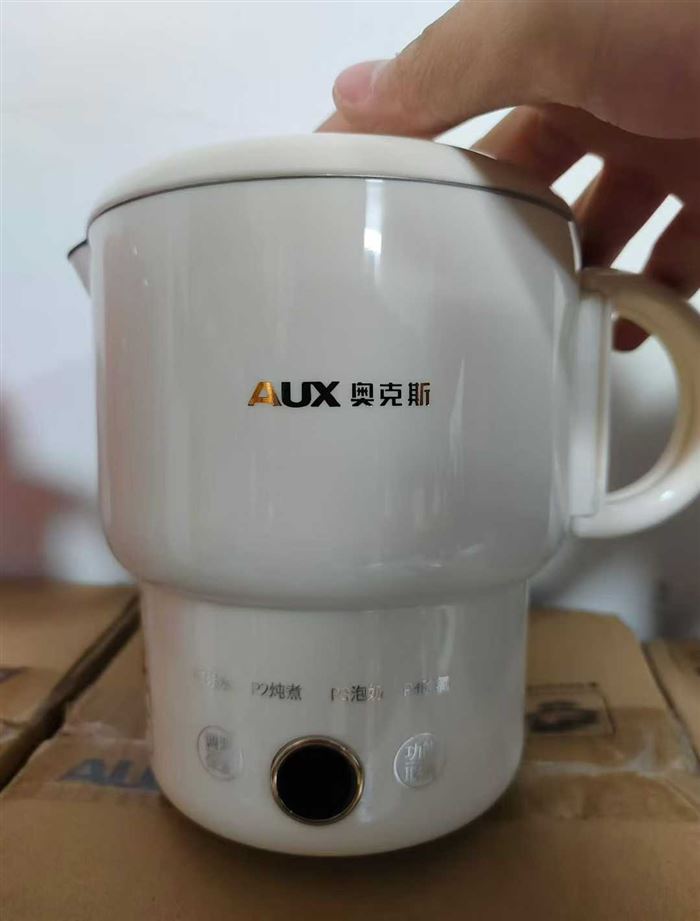 正品奥克斯便携加热杯 带防伪码 菜单多样性 塑料质感十足 食品级不锈钢材质 白色款式最多现货300个 电话微信同号15515665791 主做全品类五金百货，小电器，更多商品，欢迎国内外友人，前来加微咨询洽谈合作。