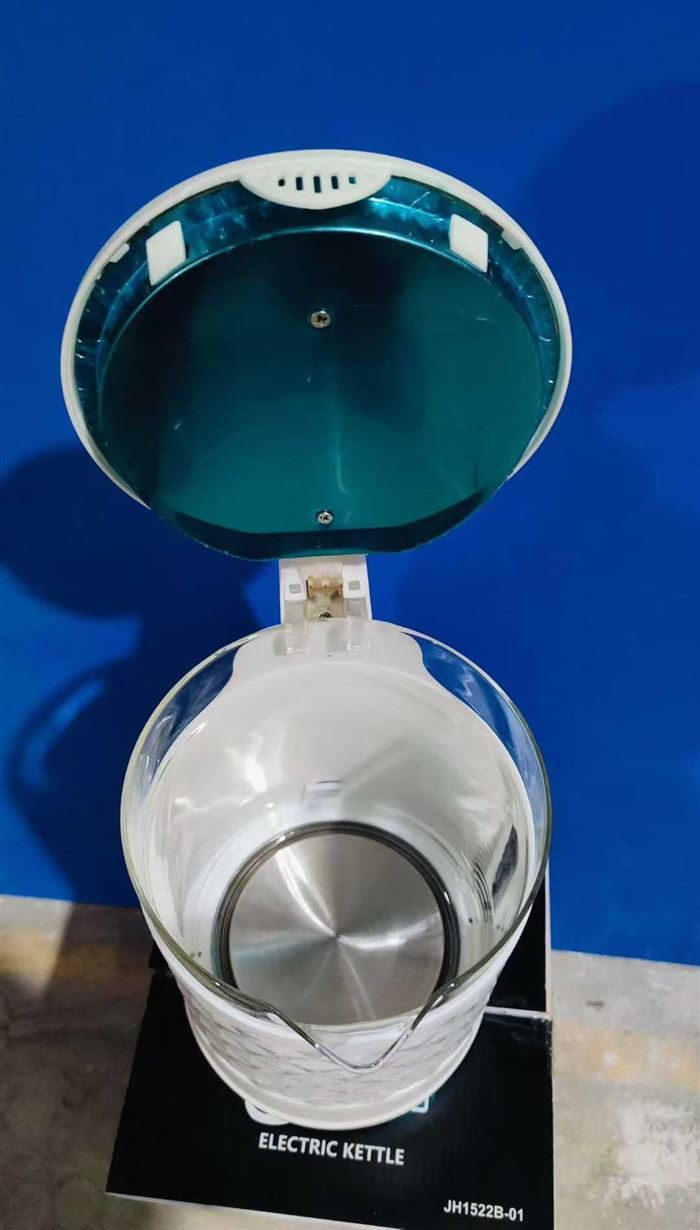 高硼玻璃电水壶， 包胶防烫， 2.3升 1084个 电话微信同号15515665791 主做全品类五金百货，小电器，更多商品，欢迎国内外友人，前来加微咨询洽谈合作。