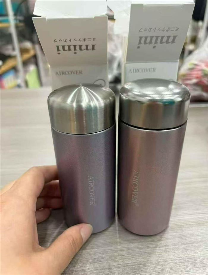 水杯 150000个口袋杯，160毫升，出口日本原单316不锈钢材质，两个颜色紫色和粉色基本平均，一箱200个清装